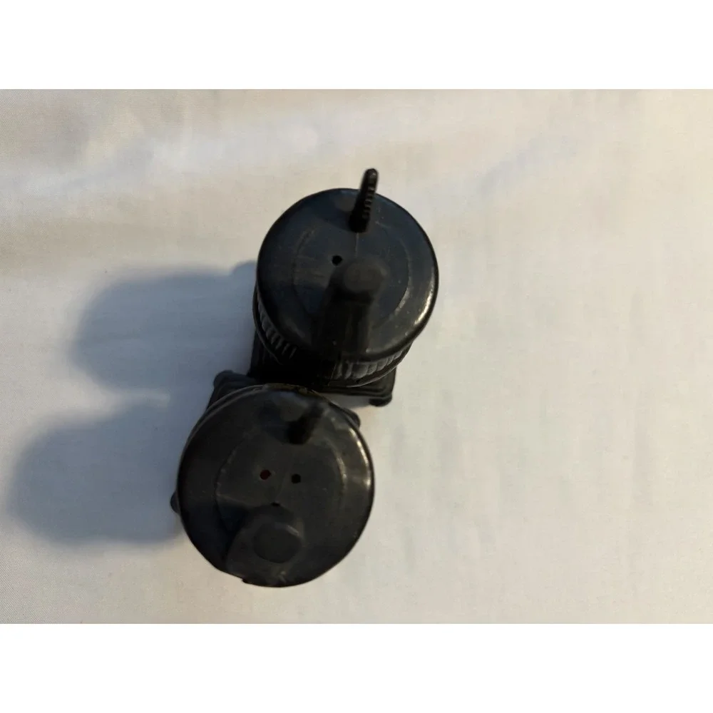 Salt and Pepper Shakers Potbelly Stove Vintage Black Gold Plastic Novelty